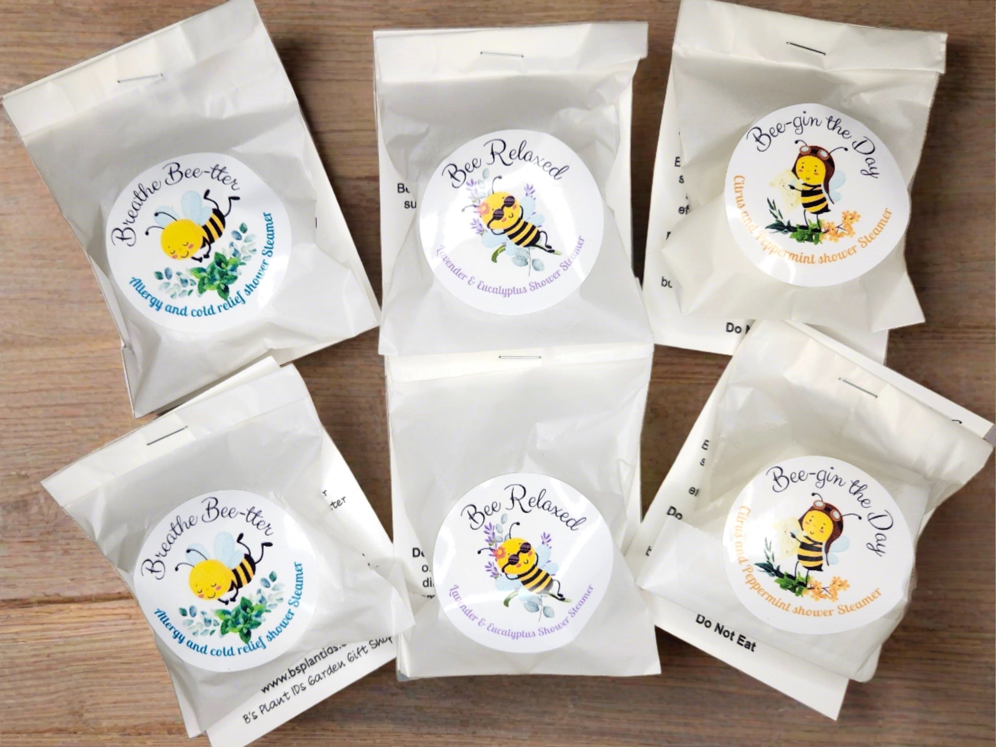 6 packages of shower steamers sitting on a counter