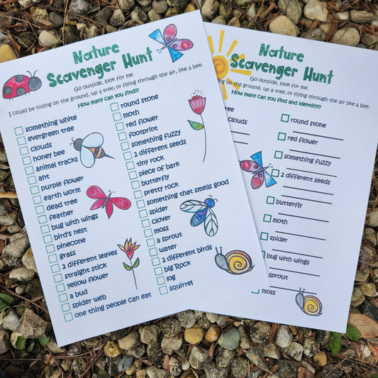 Photo features 2 8.5x11 printouts of Nature Scavenger Hunt.  40 items to find or 20 items to find and identify. 